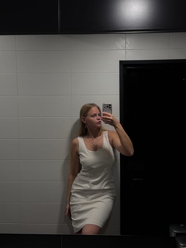 Woman takes mirror selfies in Izhevsk bathroom