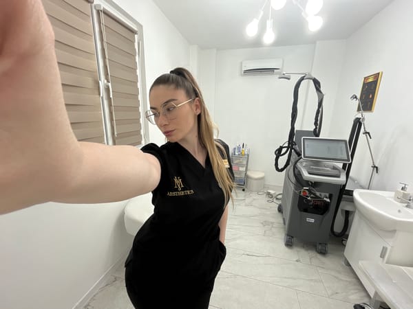 Medical aesthetics worker takes selfies during clinic visit