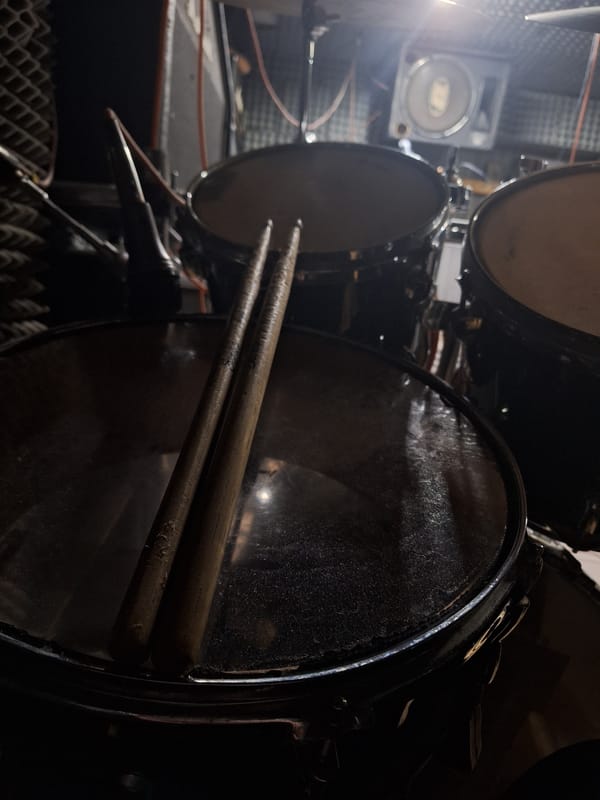 Musician photographed in studio with drum kit in Panagyurishte