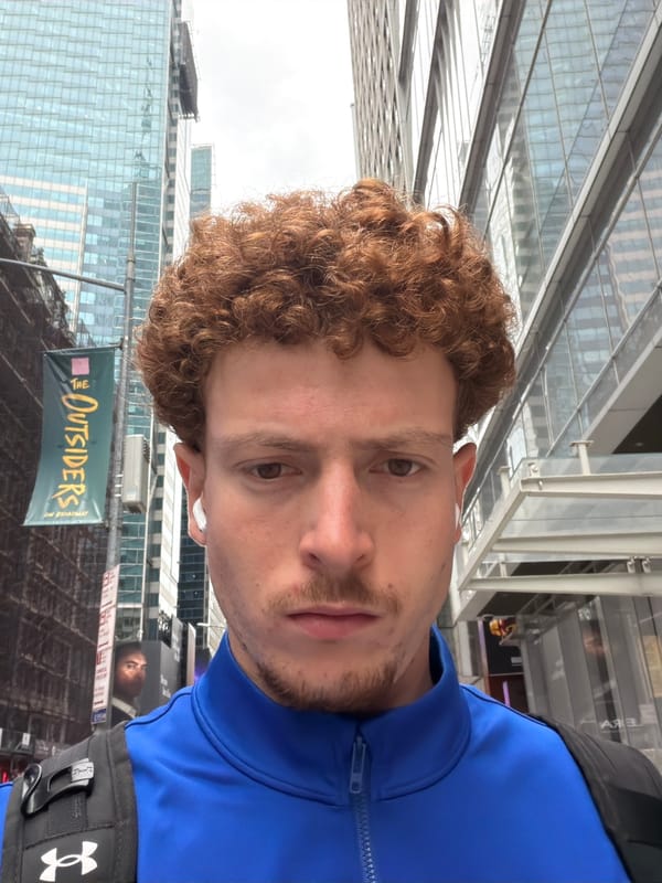 Man photographed near Broadway theater banner in NYC