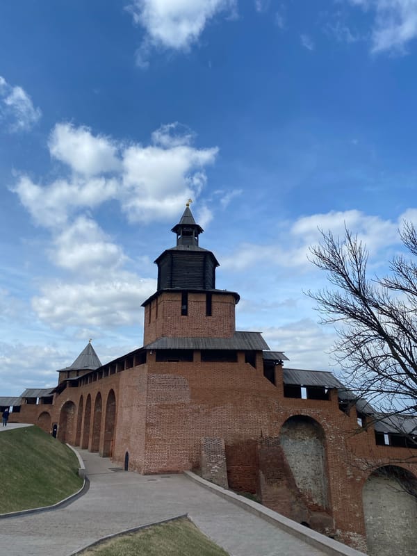Tourist documents historic Nizhny Novgorod landmarks during morning visit