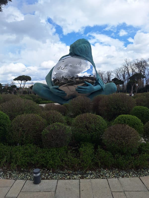 Woman-with-globe statue photographed multiple times in Krasnodar park