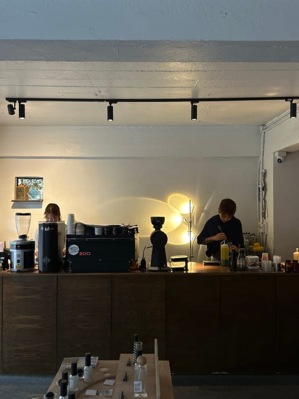Inside a Chiang Mai concept cafe with coffee, vinyl, and collectibles