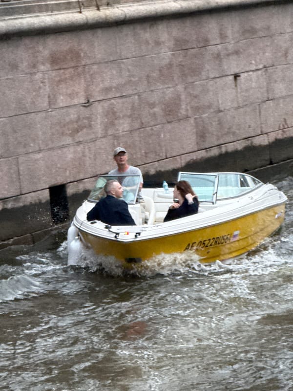 Boats, busking, and foot traffic near Kazan Cathedral