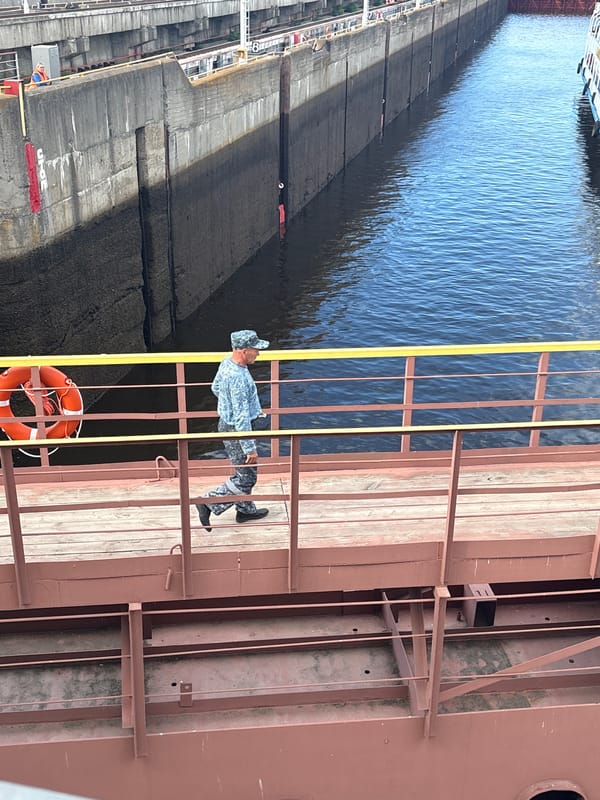River cruise ships transit the Chaikovsky Lock on the Kama