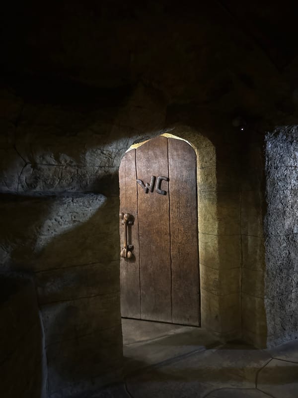 Stone architecture and a vending machine in Omurtag at night