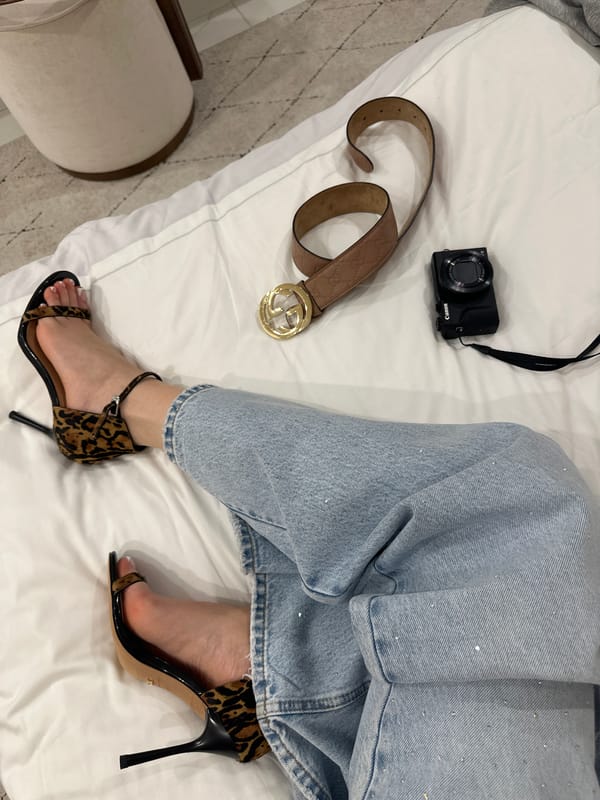 Fashion accessories and camera captured in Dubai setting
