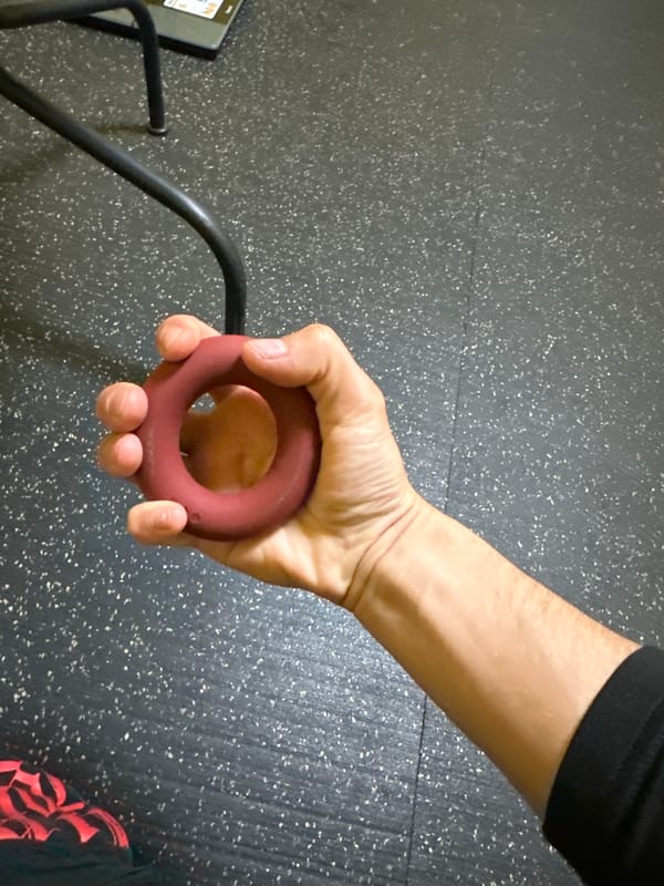 Person exercises at Bulgarian gym wearing distinctive skull patch cap