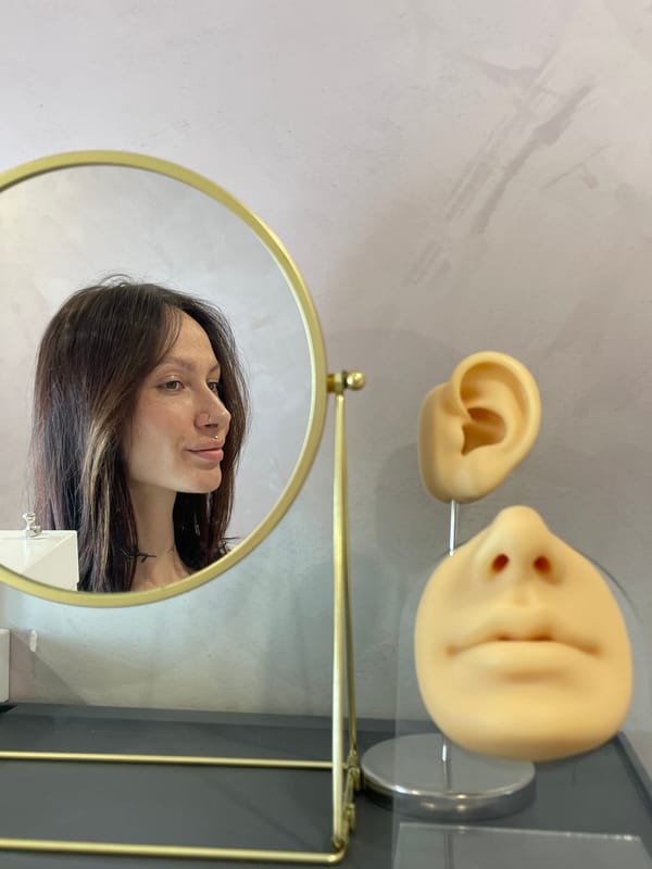 Woman takes selfies near prosthetics display in Izhevsk