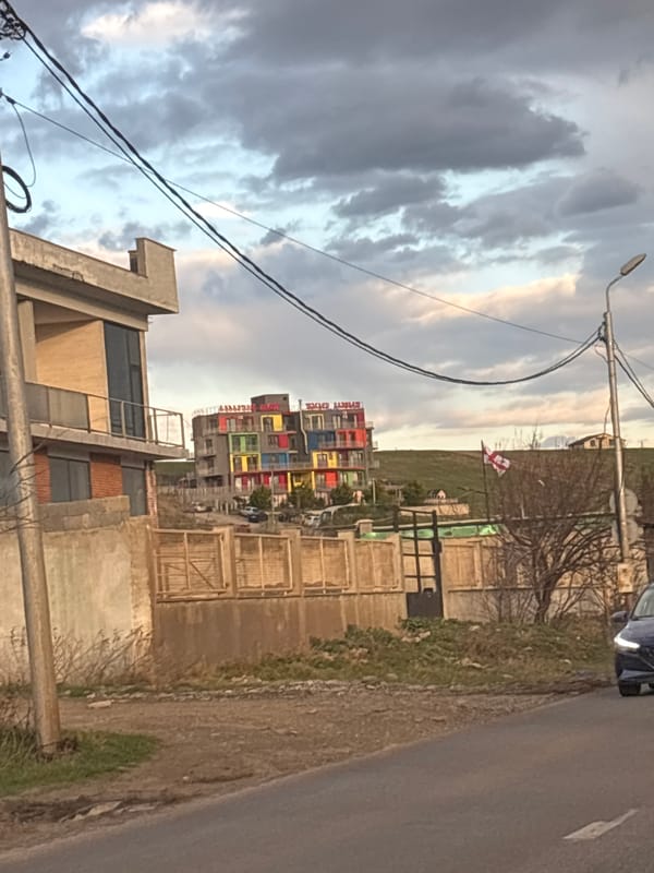 Vehicle journey through Tbilisi captures urban landscapes