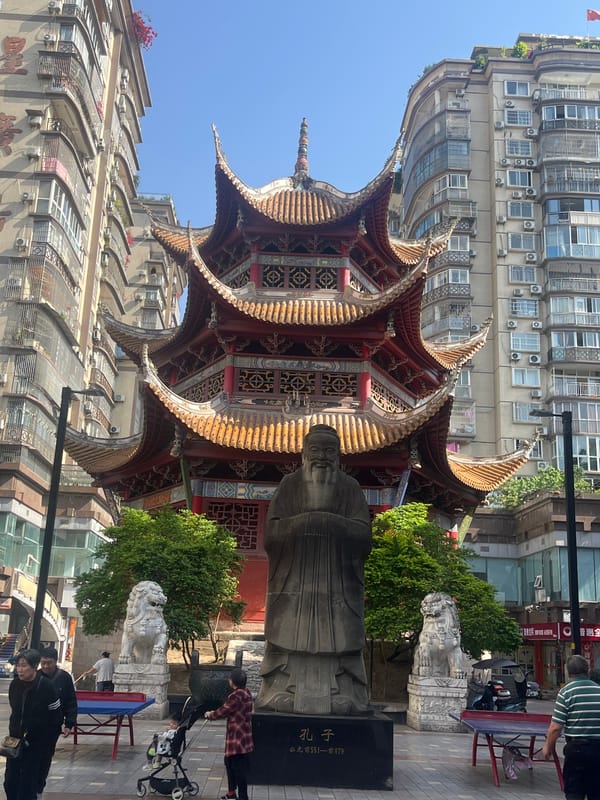 Traditional pagoda, stone statue observed in Jiangjin urban scene