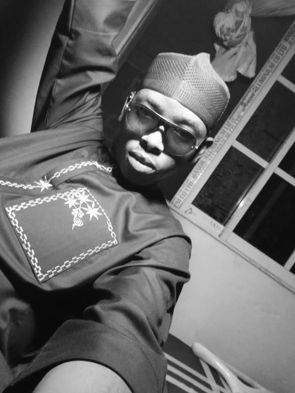 Individual documented in traditional dress during evening in Lagos