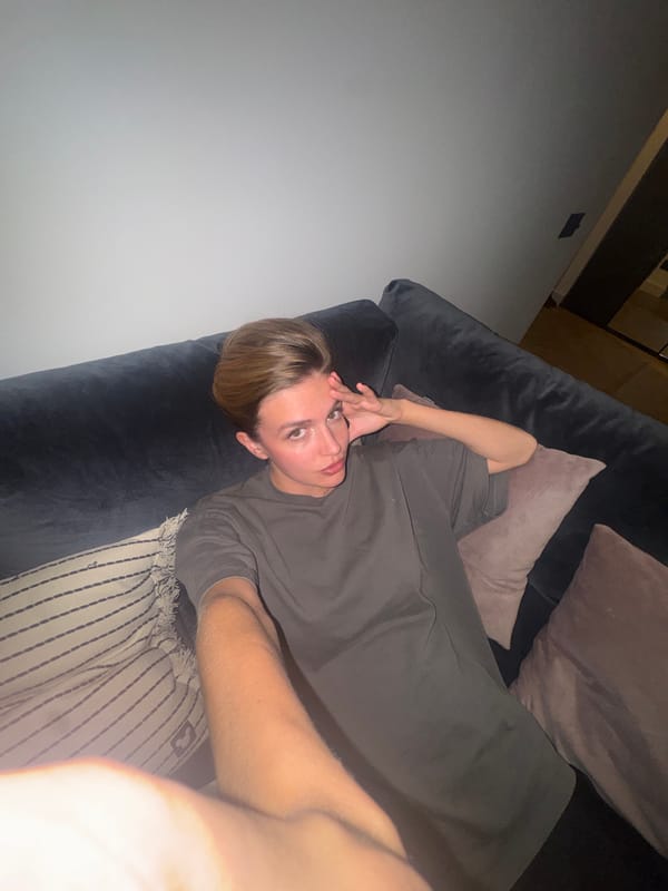 Person resting on couch captured in Yerevan home