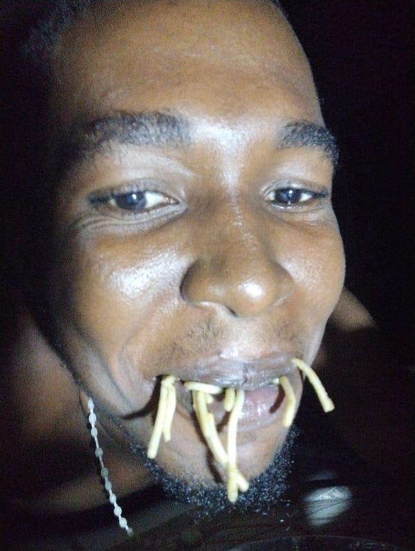 Man enjoys pasta dinner in Ihiagwa, Nigeria