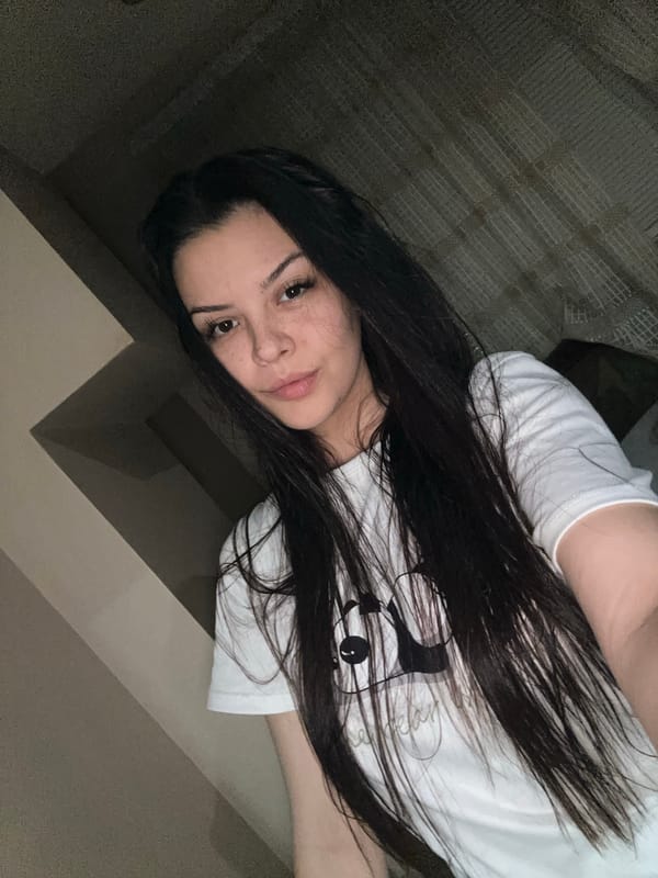 Woman takes playful selfies in Sliven, Bulgaria