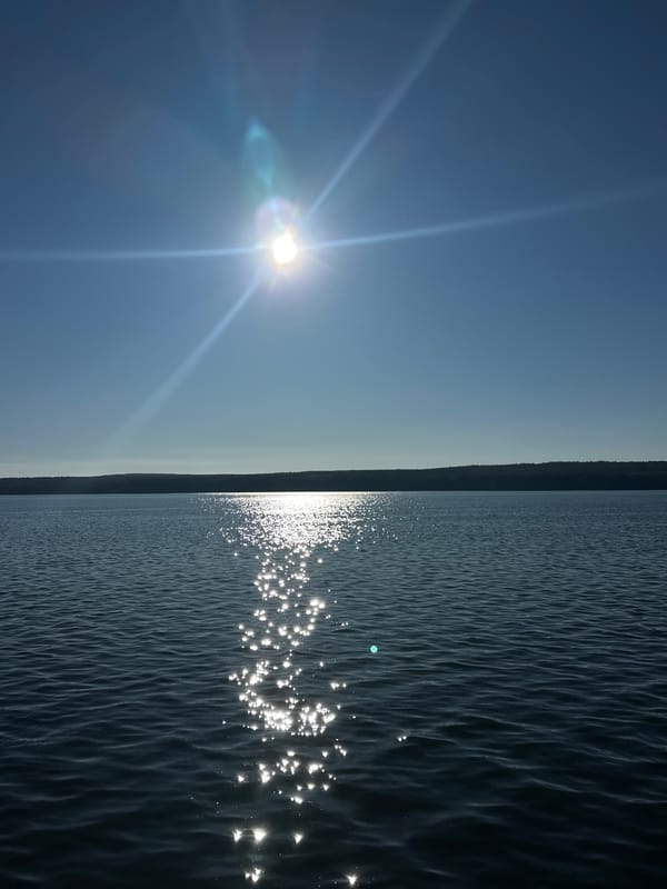 Dawn reflection photographed on water near Chaikovsky, Russia