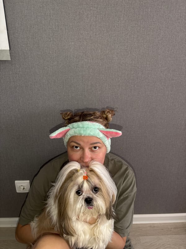 Woman and dog photographed with green toys in Izhevsk