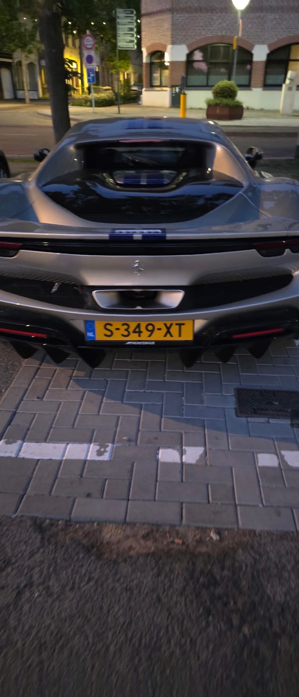 Silver Ferrari with racing stripes spotted in Venlo