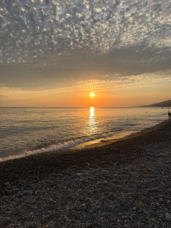 Sunset evening on Sochi's Black Sea pebble beach