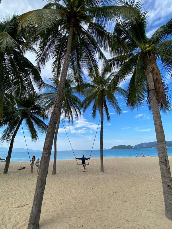 Nha Trang beachfront and park on a calm morning