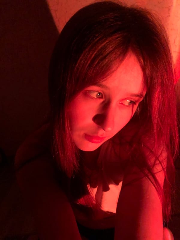 Woman documents personal moments with pets in Russian home