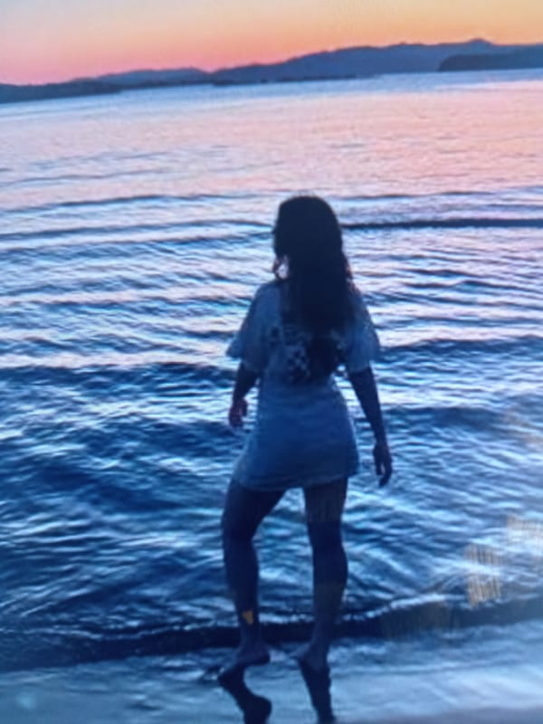Sunset beach moments: shoreline lounging, waves, and golden hour silhouettes