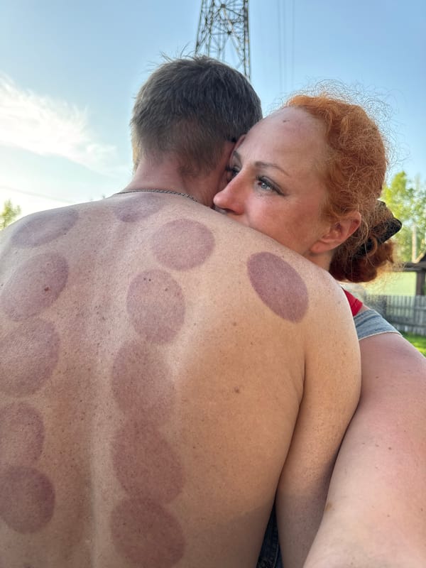 Family enjoys backyard barbecue and playtime in Chaikovsky