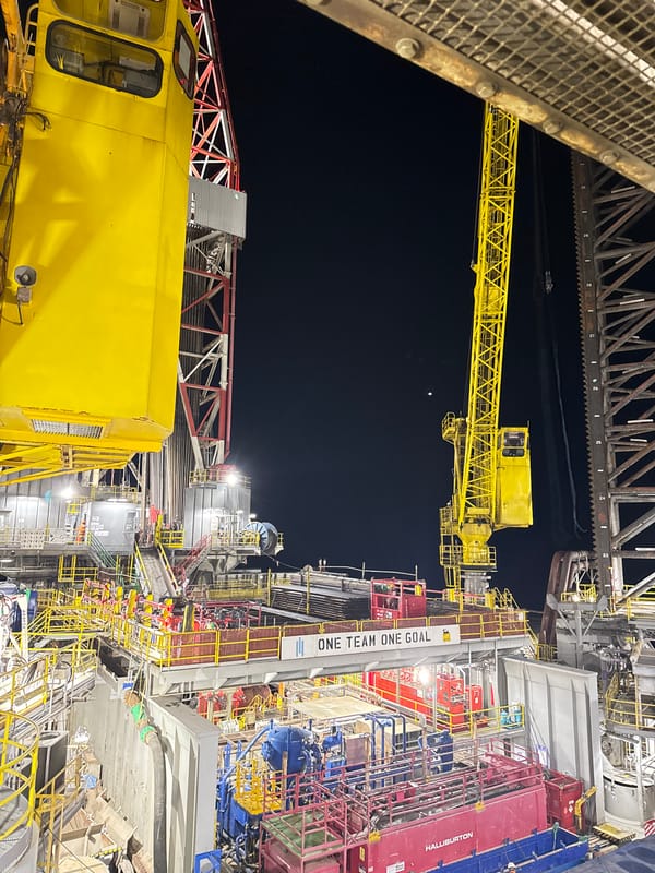 Industrial oil rig facility observed at night in Italy