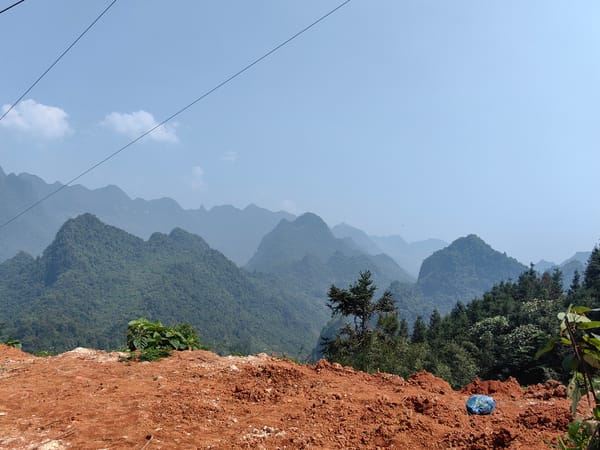 Couple Takes Scooter Selfie in Vietnamese Mountains