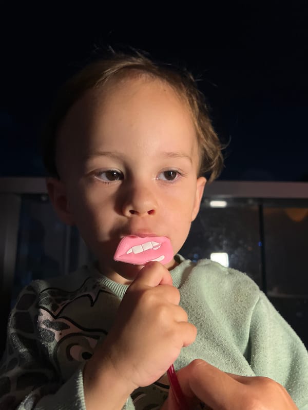 Family dinner with playful child documented in Kiryat Bialik