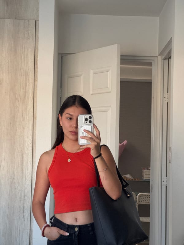 Woman takes mirror selfie in Ocotlán, Mexico