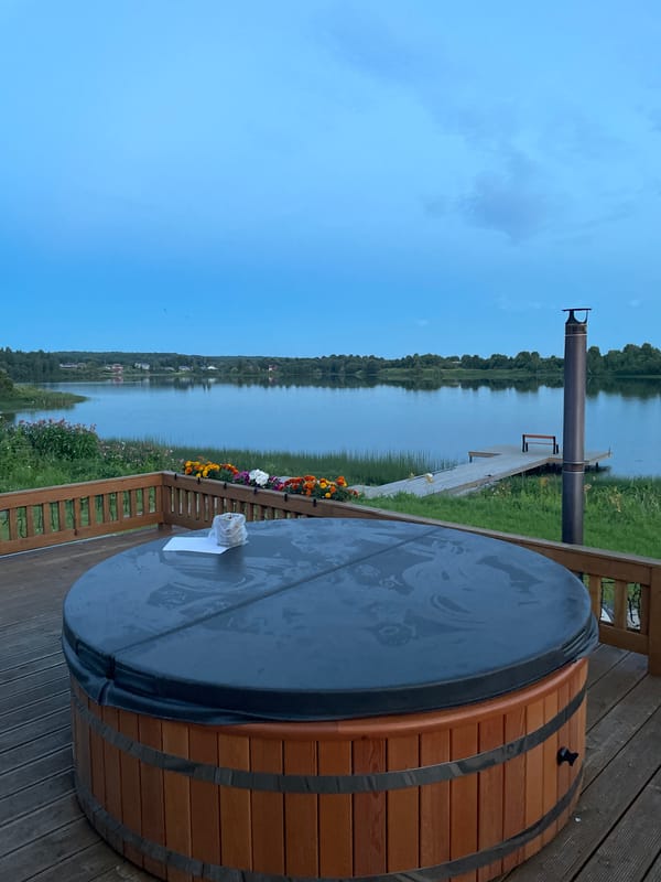 Midsummer evening on a lakeside deck in Karelia