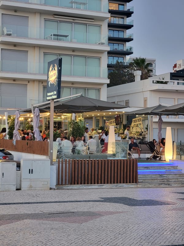 Sunset hour on the Quarteira beachfront promenade