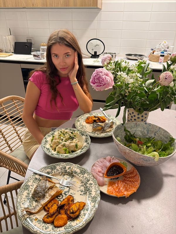Woman dining at table captured in Tel Aviv interior