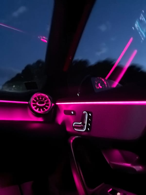 Car interior with pink ambient lighting observed in Srebarna