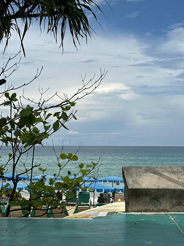Elevated view over Karon Beach from a balcony or rooftop