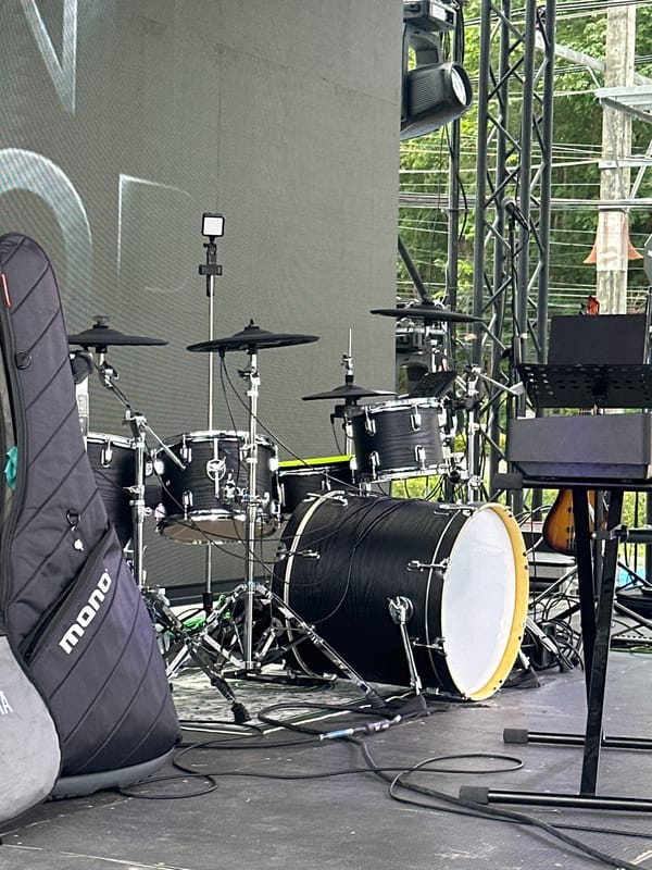 Outdoor music performance setup captured in Wichit, Thailand