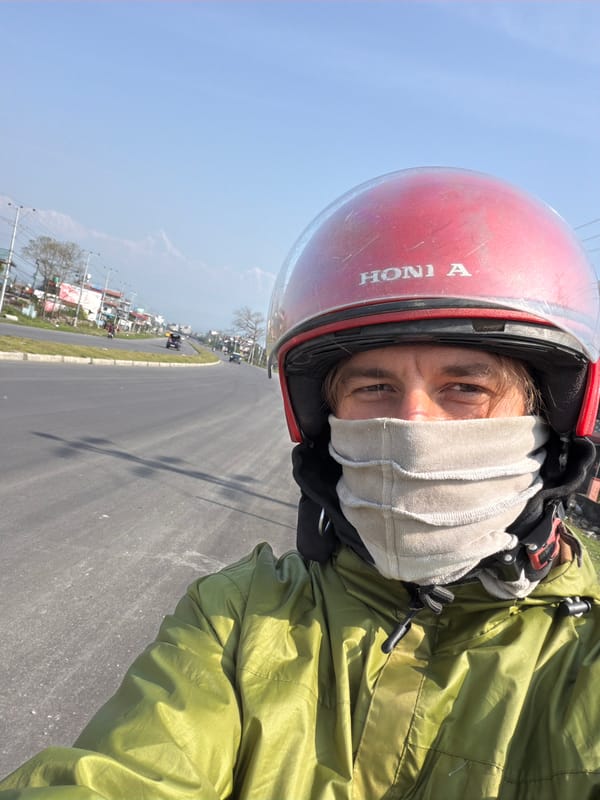 Early morning motorcycle ride through Pokhara streets