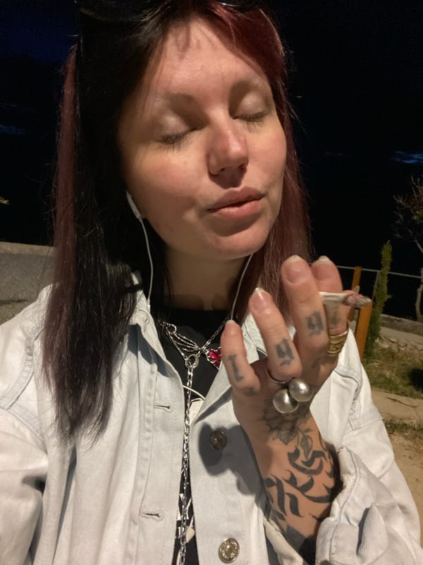 Tattooed dog walker spotted across Montenegro coastal towns evening