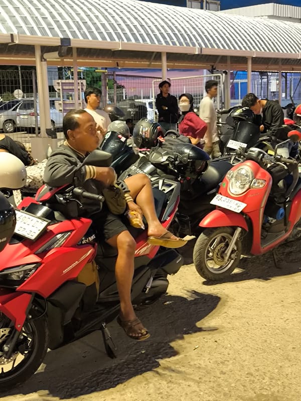Motorcycle riders gather, travel on ferries in unknown location