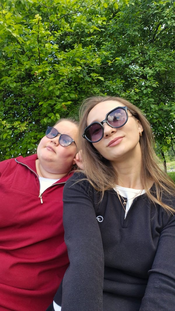 Women take selfies during afternoon outing in Chaikovsky park