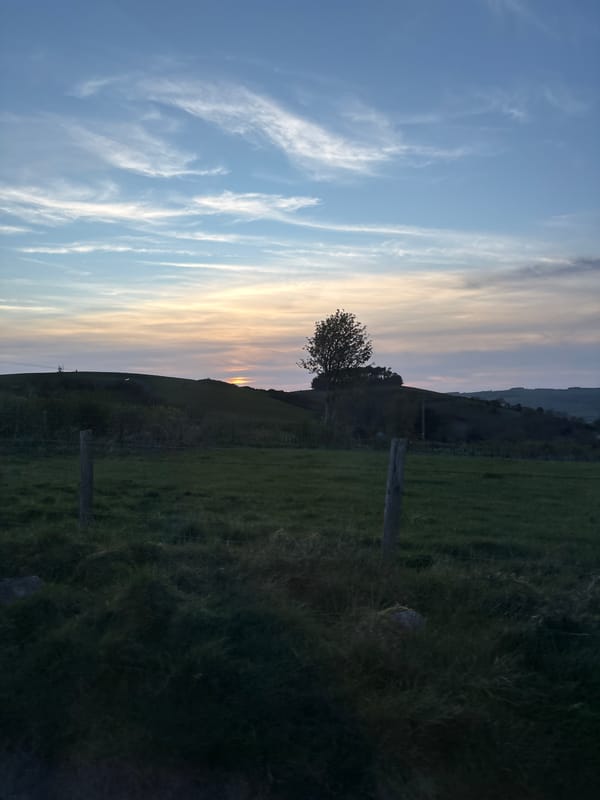 Dusk landscape observed near Shrewsbury with streaked sky