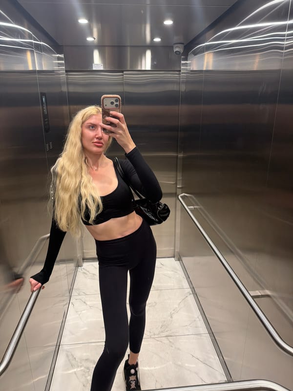 Belgrade moments: elevator selfie and cat among roses