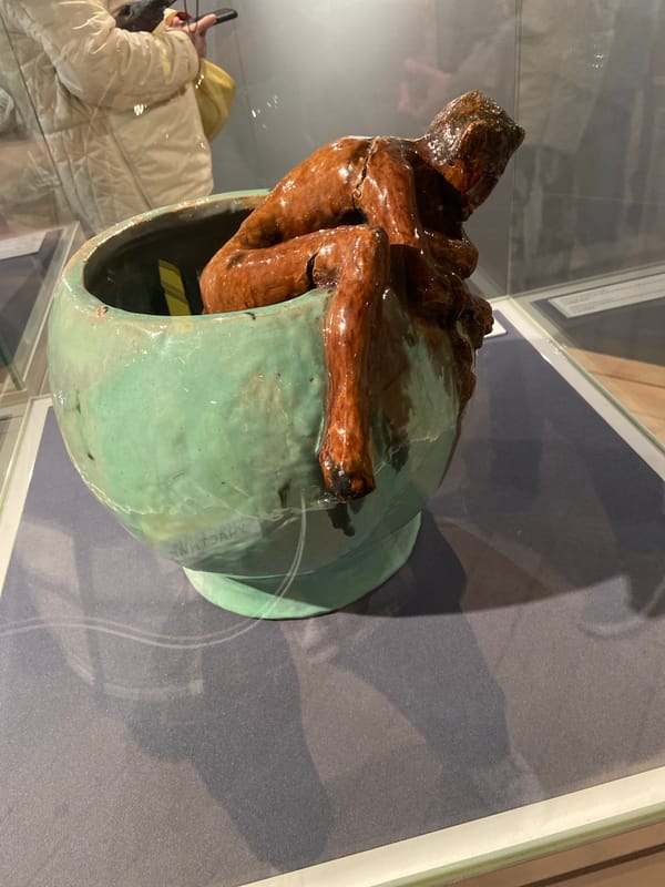 Museum visitor documents Russian ceramic art collection in Abramtsevo