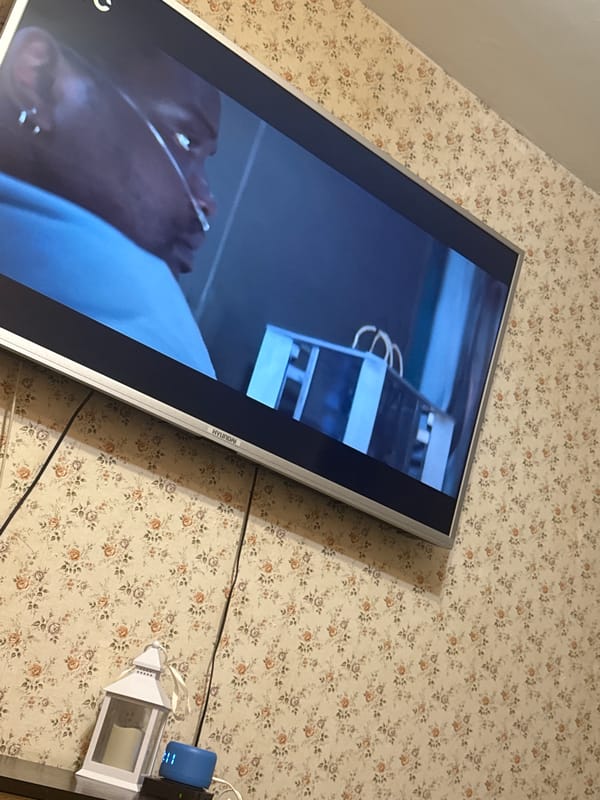 Mytishchi resident watches hospital drama on wall-mounted TV