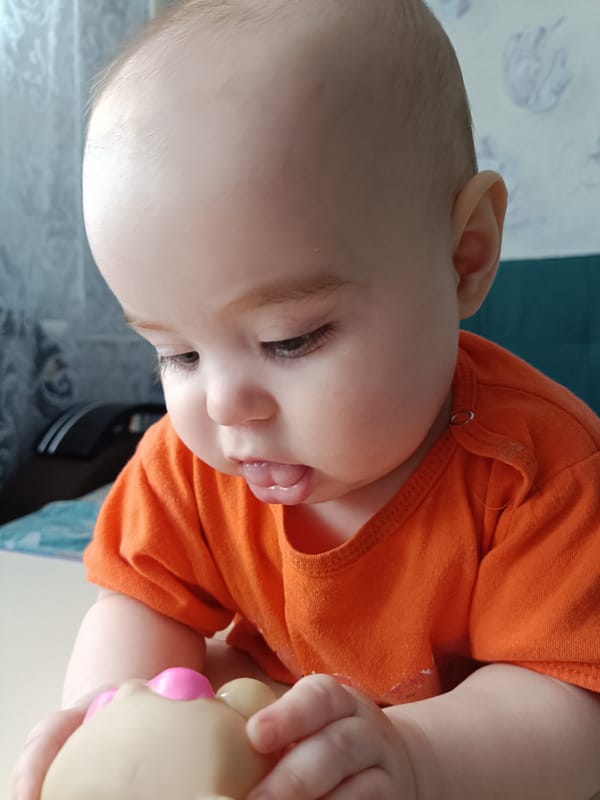 Baby photographed in multiple settings in Noviy, Russia