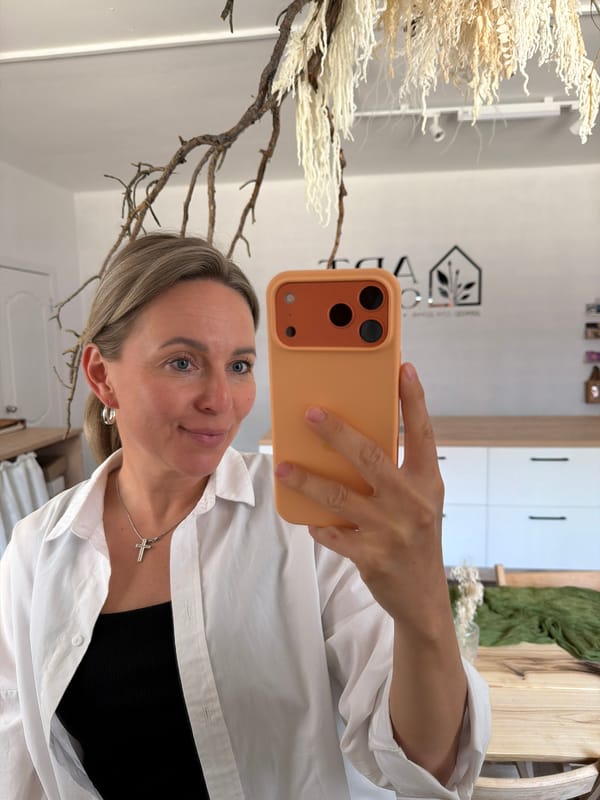 Woman documents cafe visit with selfies in Chaikovsky, Russia