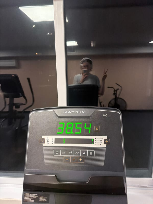 Late-night fitness session captured in Laval window reflection