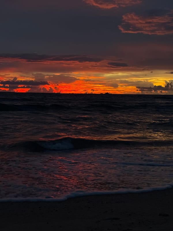Sunset crowd gathers on Choeng Thale beach, Andaman Sea