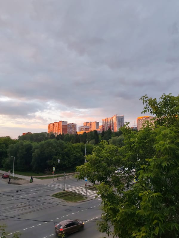Golden hour sunset documented across Izhevsk streets and buildings